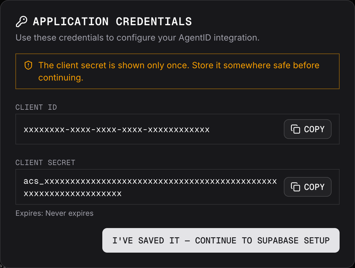 The AgentID console's Application credentials window, warning that the client secret is shown only once, with copy buttons for the client ID and client secret.